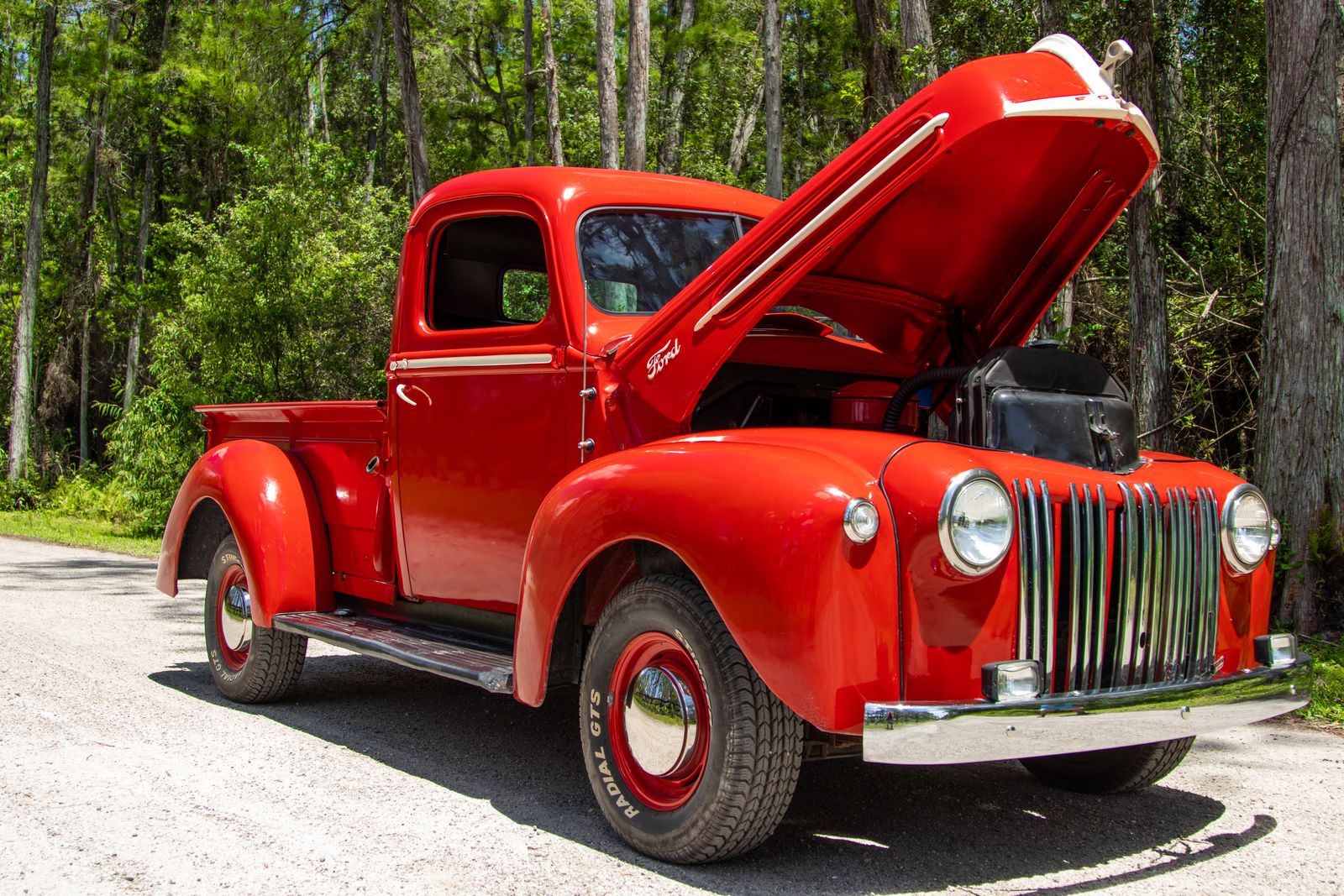 Classic red Ford pickup truck from decades past